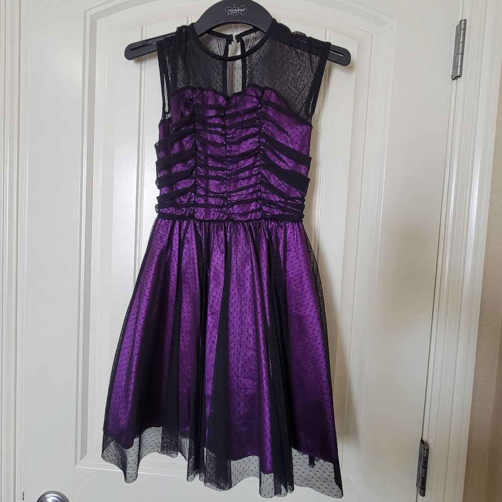 Purple and black dance costume